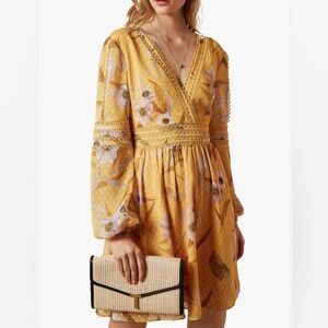 Ted Baker-Yellow mini with pink floral print and eyelet crochet trim.Size 10